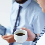Coffee badging: what it is, why people do it, and how to address it